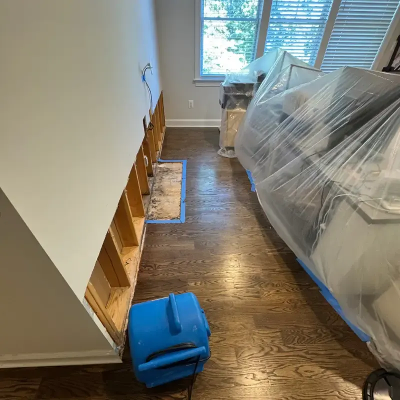 Containment and drying equipment set in a living area